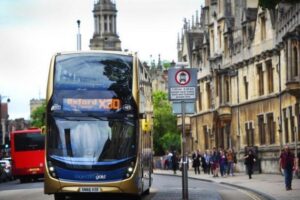 Picture of a bus passing a bus gate in Oxford